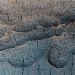 Water is thought to exist in large deposits beneath the Martian surface