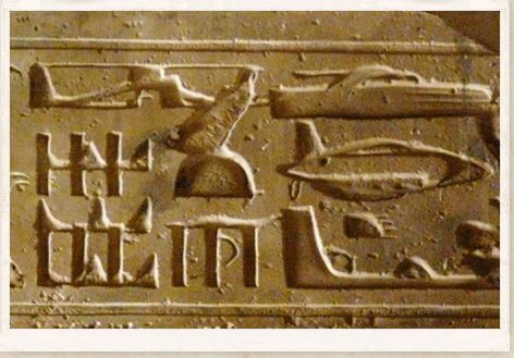 Egyptian temple wall at Abydos are strange hieroglyphics which depict what appears to be modern day aircraft.