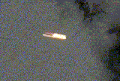 Brisbane -- UFO Sighting of pill shaped red and white cylindrical object on October 16, 2016.